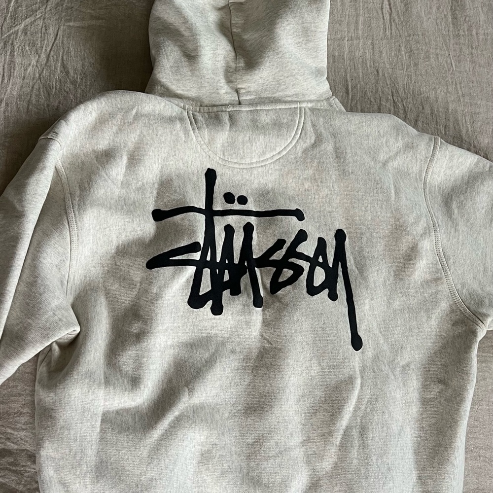 Stussy Light Gray Hoodie with Black Tag Logo
